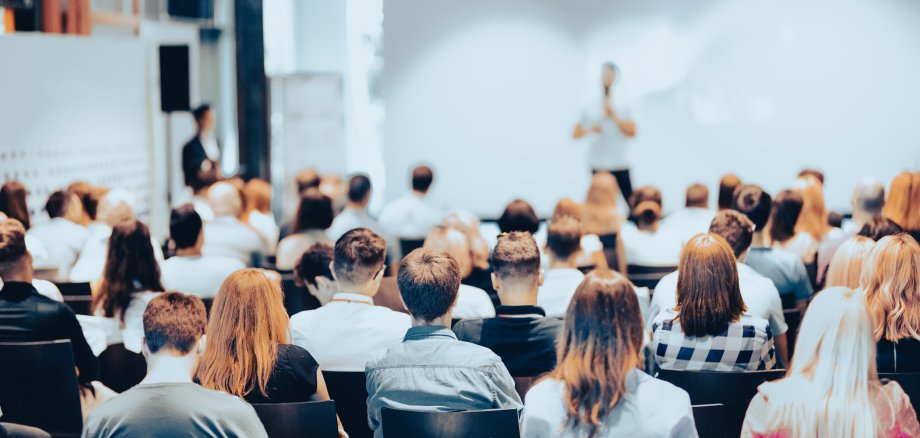 Rear View Of People During Seminar