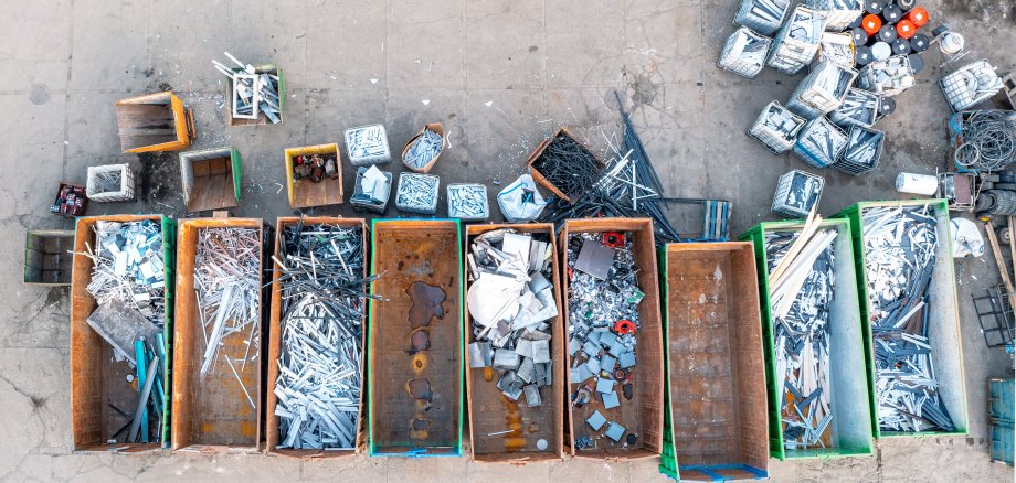 Containers from a height with different types of metal, Sorting for remelting metal products